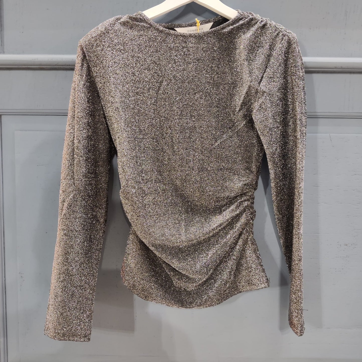 Top a maniche lunghe argentato brillante