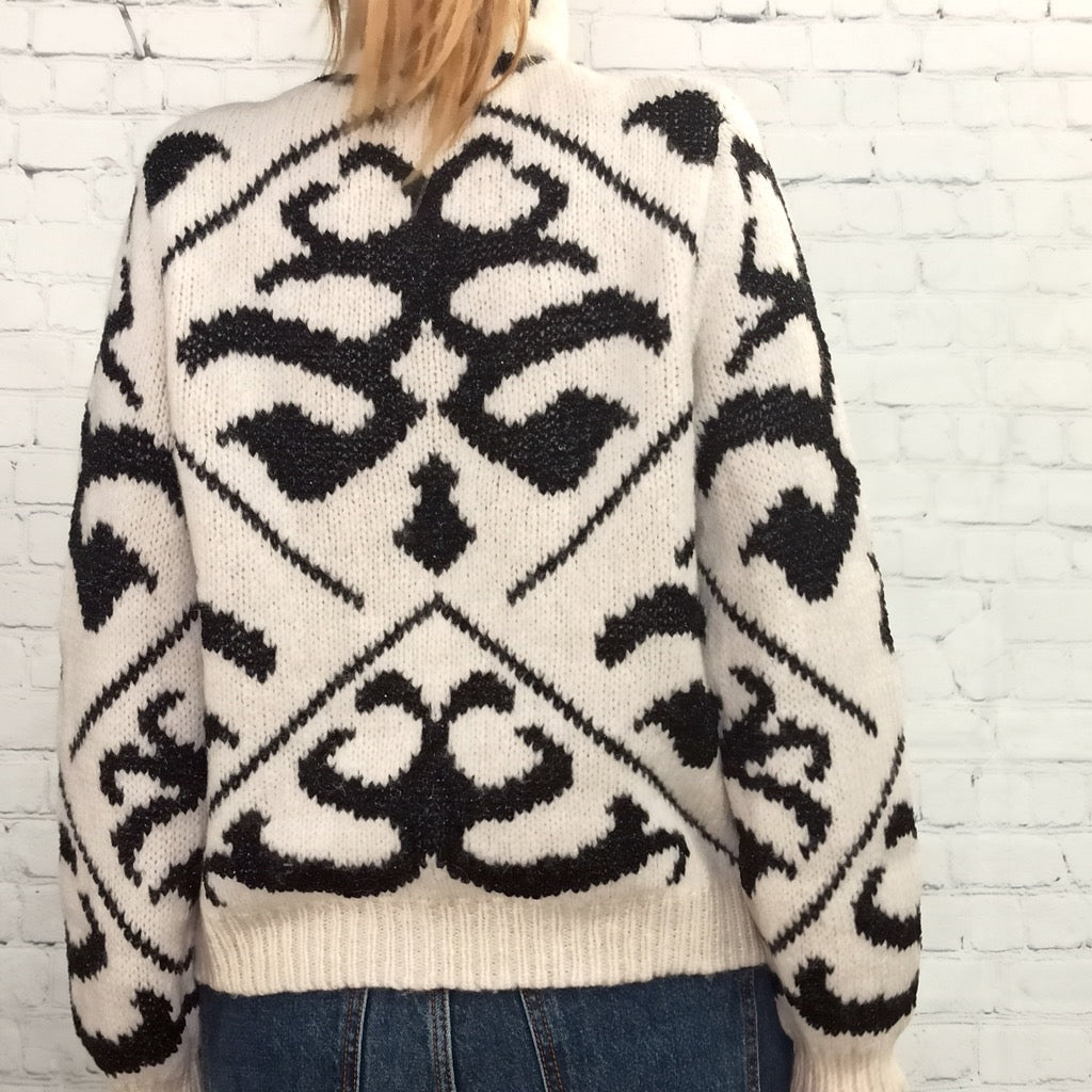 Maglione a collo alto geometrico bianco