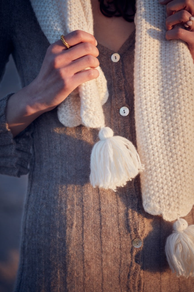 Sciarpa cream con pompon