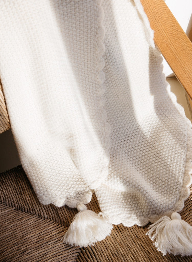 Sciarpa cream con pompon