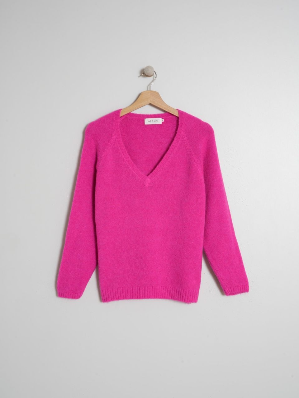 Maglione con scolllo a V fucsia